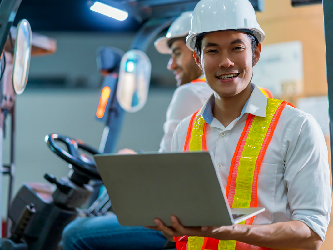 Warehouse professional coordinating cargo operations